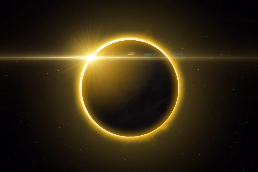 The sun's corona glowing around the black disc of the moon during totality